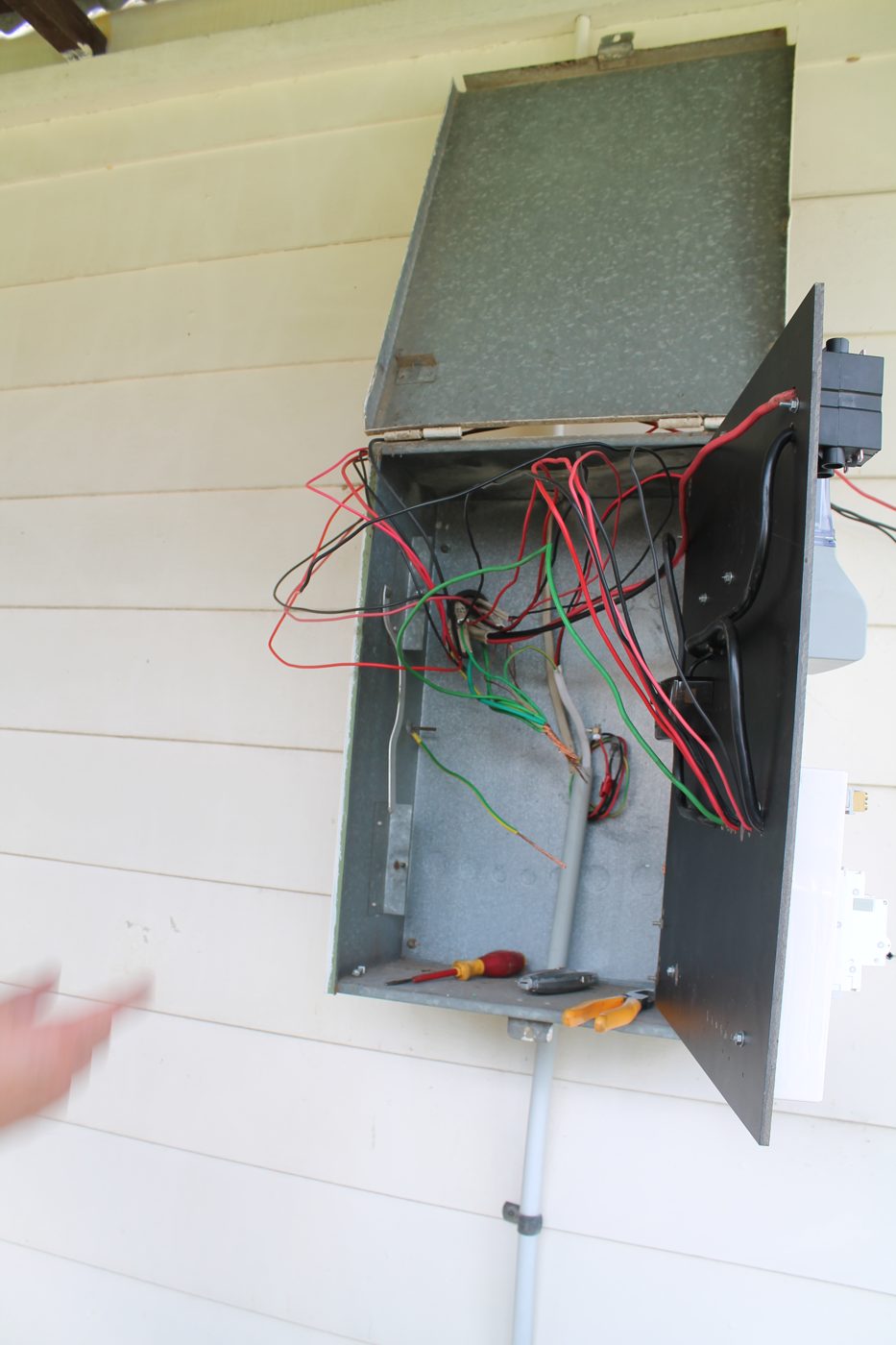 Open switchboard being repaired